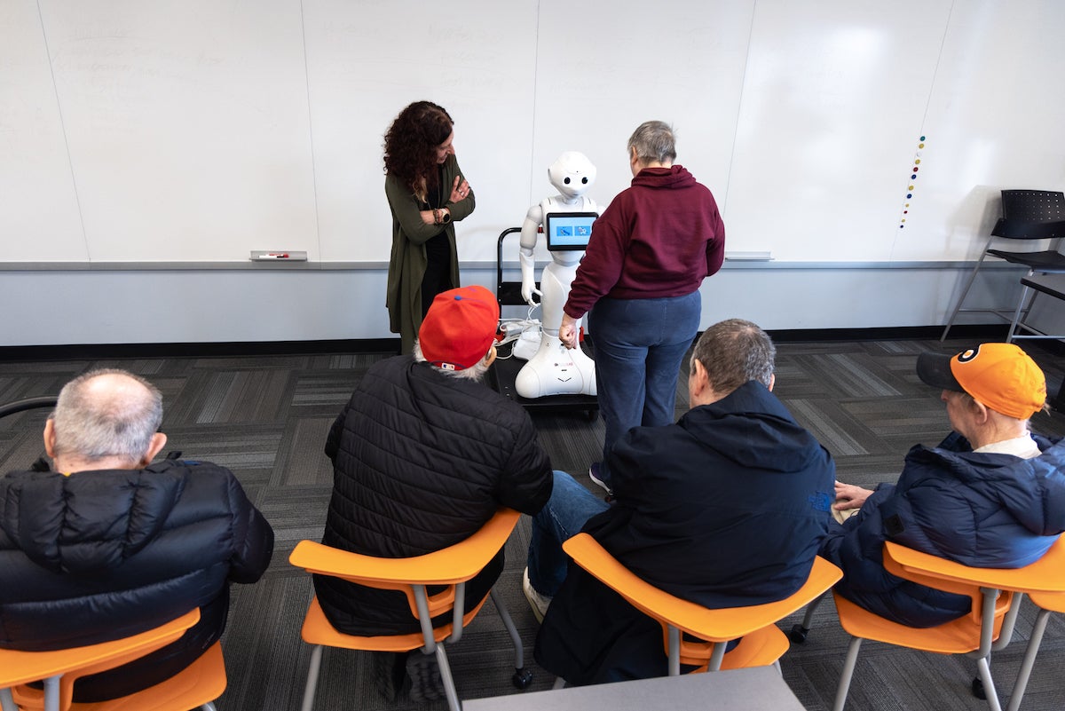 Enhancing the Lives of Aging Adults with Autism through AI Robotics